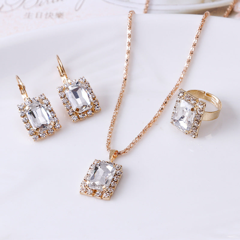 Collier en cristal boucle d'oreille anneau trois pièces