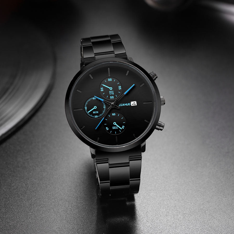 Tendance simple à trois yeux Calendrier Alloy Band Quartz Montre