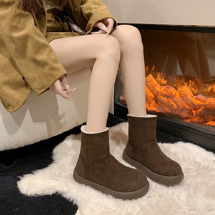 Bottes de laine d'agneau et de peluche rétro