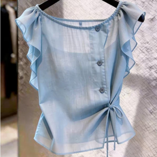 Haut bleu des femmes d'été