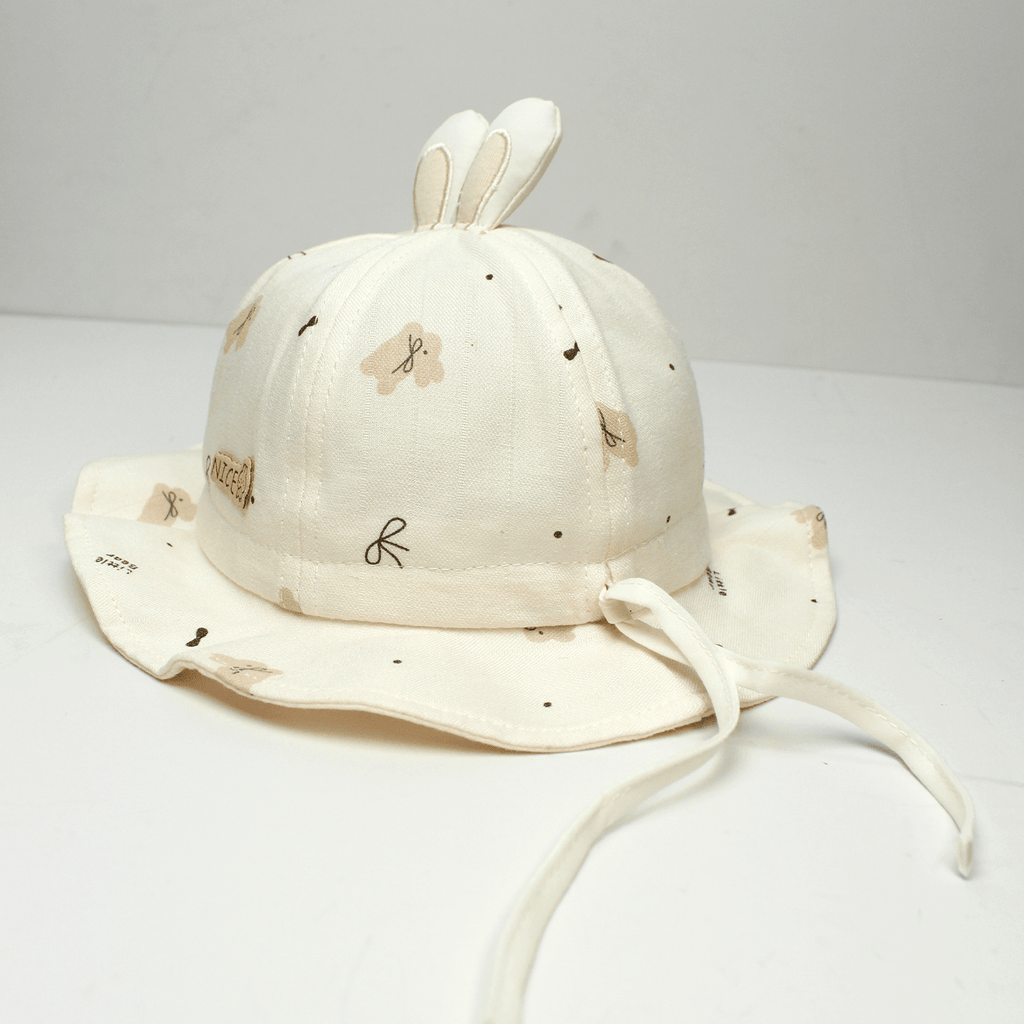 Les oreilles de lapin en peluche homme et femme avec le logo NlCE et le motif imprimé