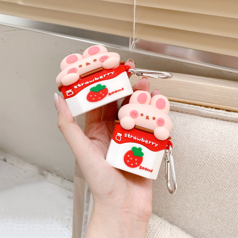 Coffret d'écouteur sans fil de lait de fraise mignon Silicone