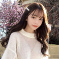 Cheveux bouclés longs rose clair