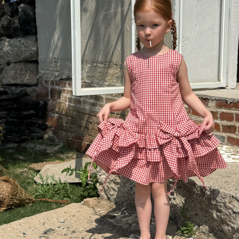 Robe à carreaux sans manches de fille avec arc rouge et jupe à manches multiples