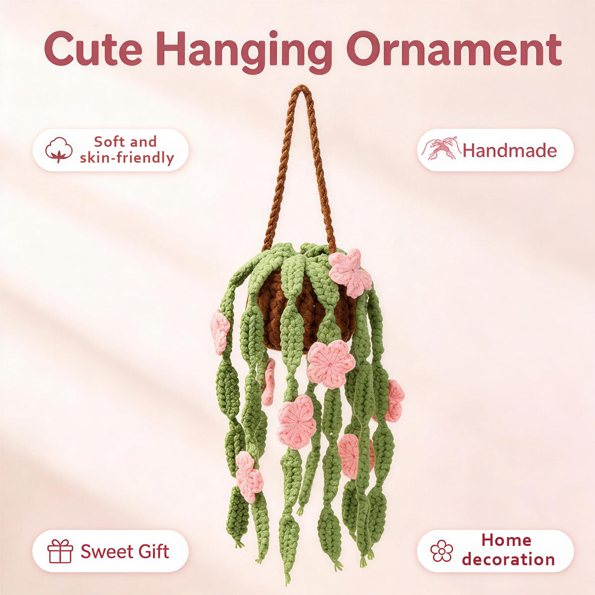 Crochet à la main suspendu Pot ornement avec des feuilles vertes trailing et des fleurs roses jamais