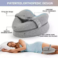 Coeur façonné pour dormir dans le lit un oreiller de jambe