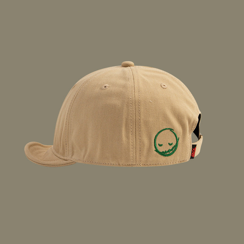 Men's and women's style Embroidered solid color Simple smile face short adjustable brim