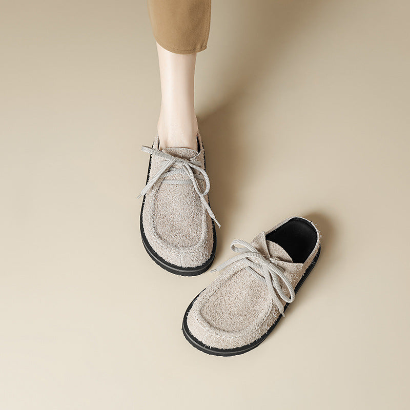 Pantoufles de boccon en cuir véritable