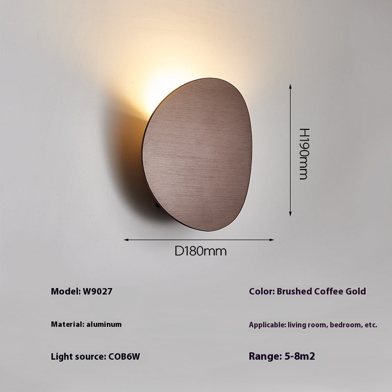 Lampe murale simple côté lit