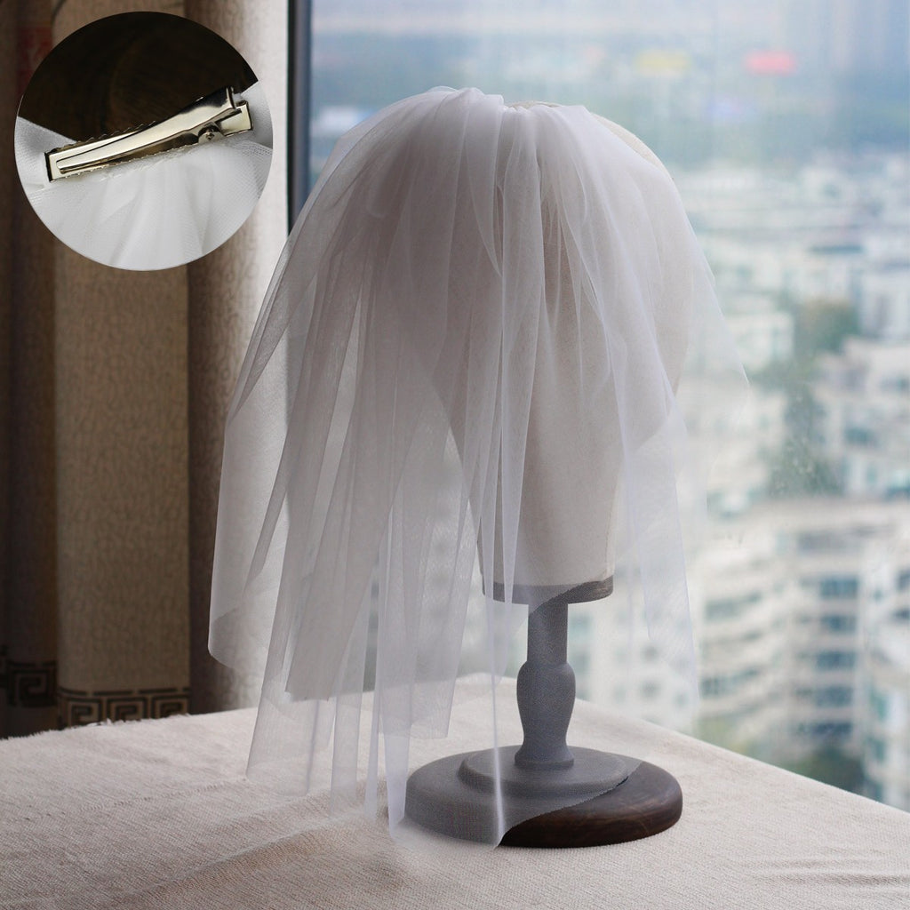 Rétro femme mariée courte coiffure mariée