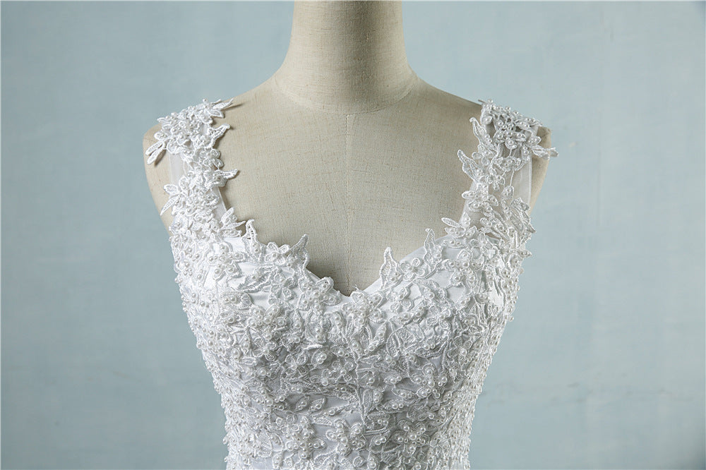 Robe de mariée haute taille avec col en V profond