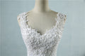 Robe de mariée haute taille avec col en V profond