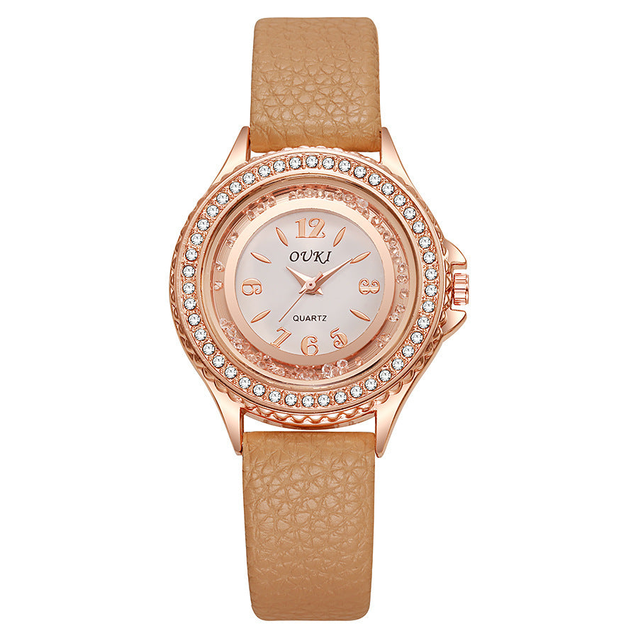 Élégante et minimaliste montre féminine ronde en strass