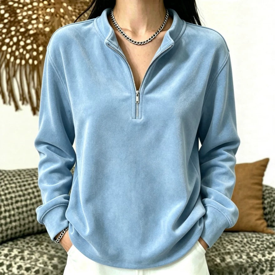 Top à manches longues de couleur unie avec un collier et une fermeture éclair
