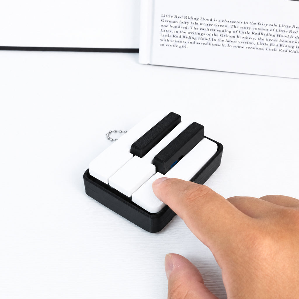 Mini porte-clés pour piano Fidget