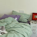 Ensemble de literie quatre pièces en coton pur rayé style Instagram nordique