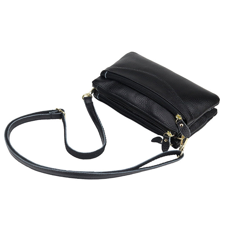 Les femmes petit sac de corps avec des compartiments multiples en cuir plein grain
