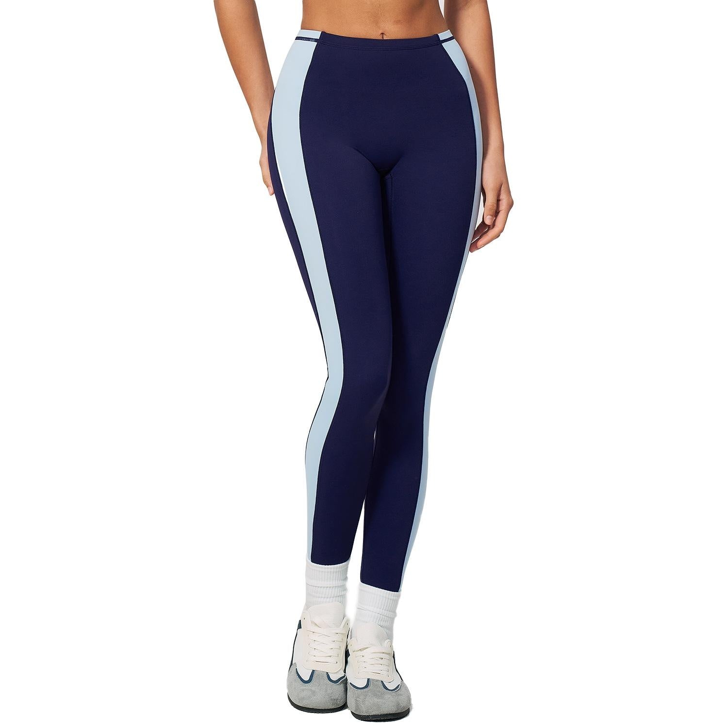 Pantalon de yoga couleur contrastante avec un lifting des fesses