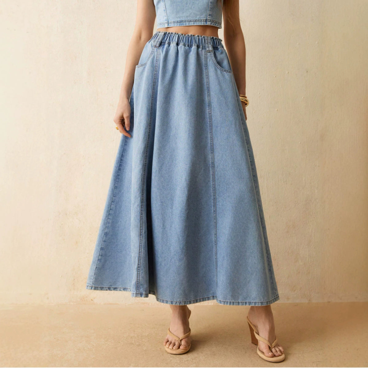 Jupe de denim décontractée lavée par les femmes avec la taille élastique et l'ourlet