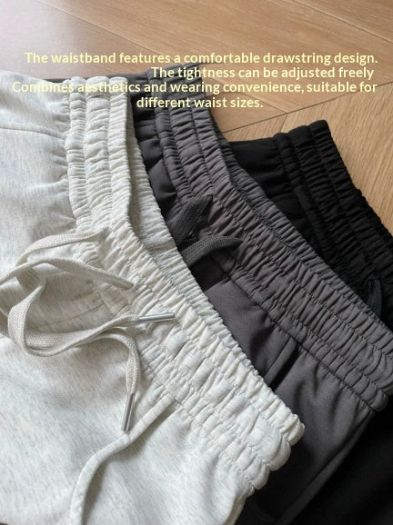 Pantalons élastiqués à taille sabre en trois couleurs
