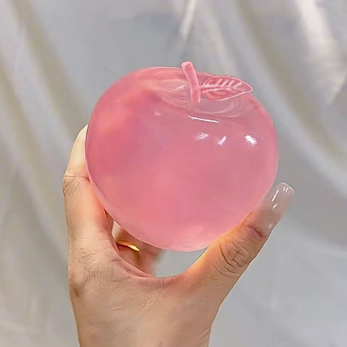 Jouet vert en forme de pomme Moldable Squeeze