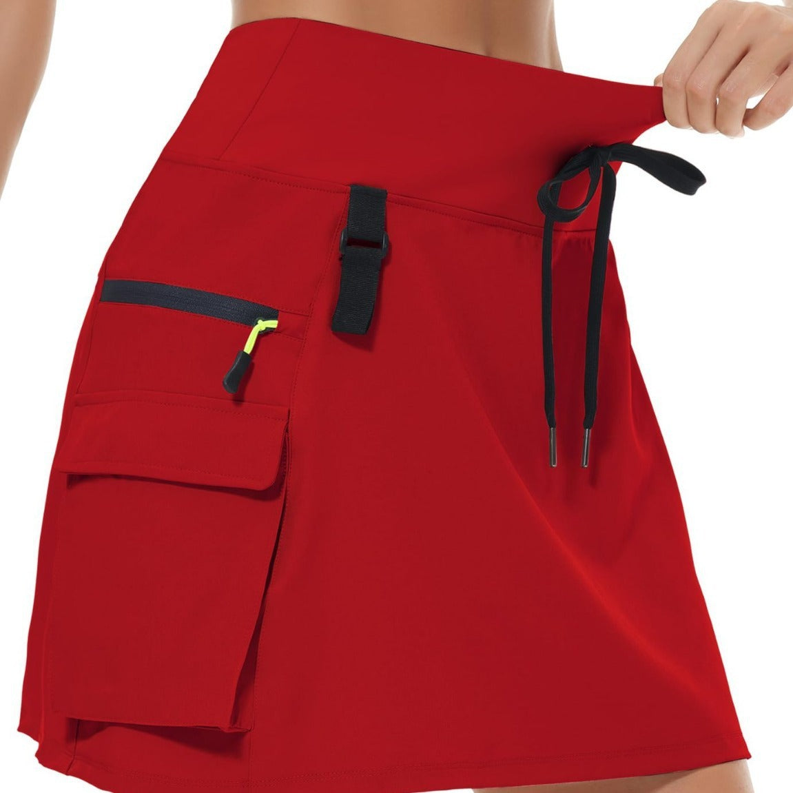 Jupe de tennis à manches rapides en polyester à vente chaude pour femmes avec une taille élastique et des poches zippées
