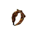 Simple bande de cheveux de tissu large bordé avec un motif imprimé et un noeud lié