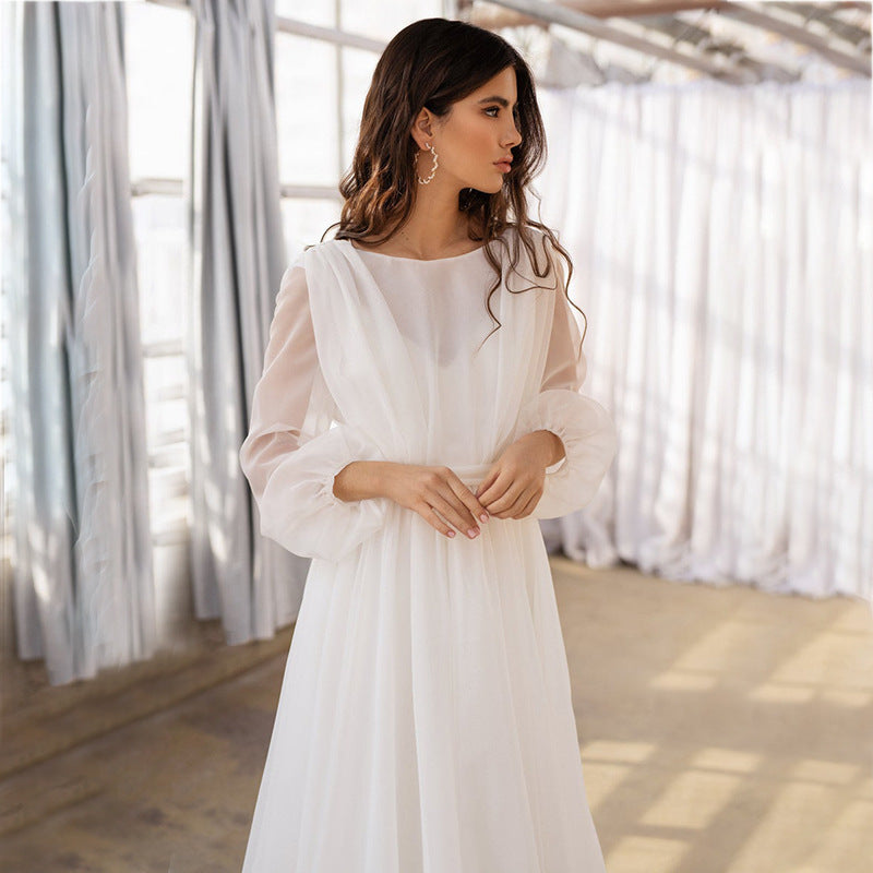Robe de mariée à manches longues de style français avec une taille ajustée