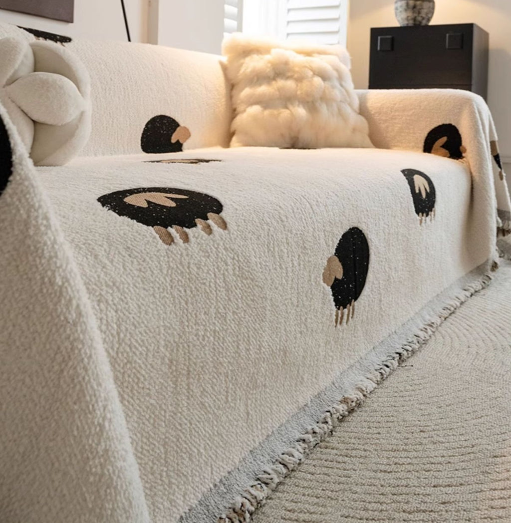 Couverture de canapé d'une pièce qui couvre entièrement le canapé