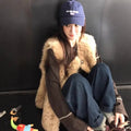 Veste en cuir et en fourrure mi-longueur
