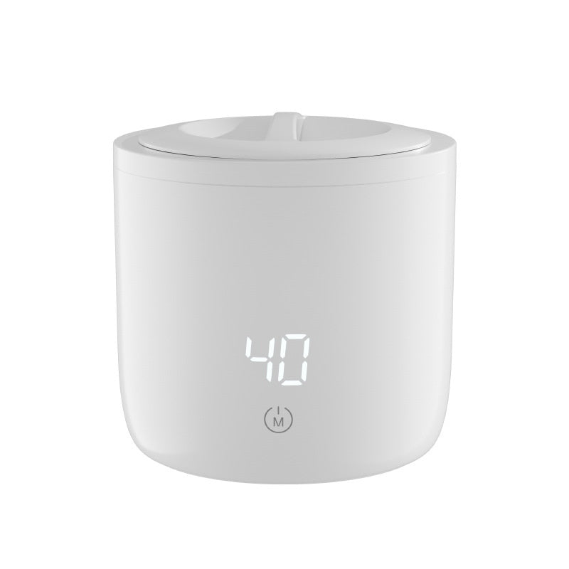 Le chauffage et l'isolation automatiques intelligents et pratiques deux-en-un chauffe-lait