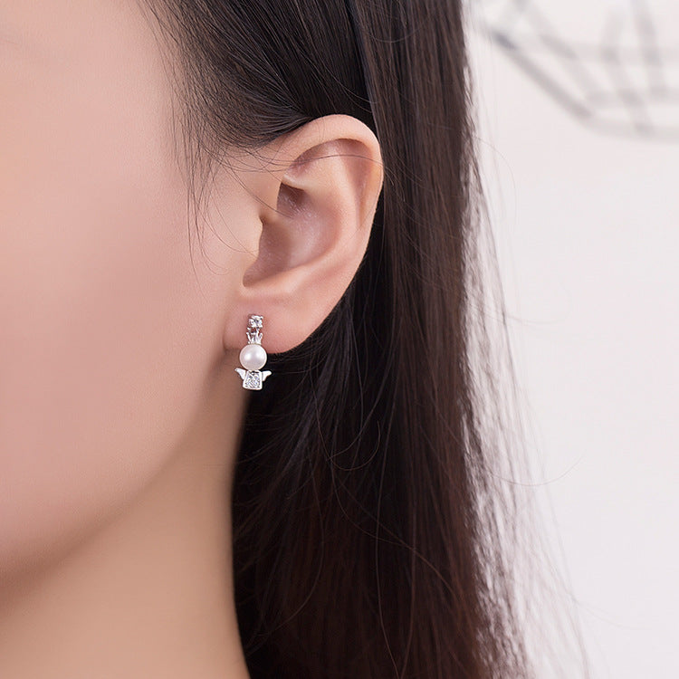 Petites boucles d'oreilles ange bébé