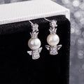 Petites boucles d'oreilles ange bébé