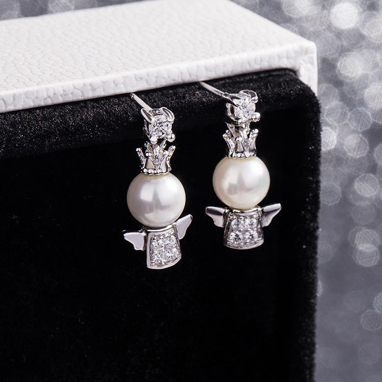 Petites boucles d'oreilles ange bébé