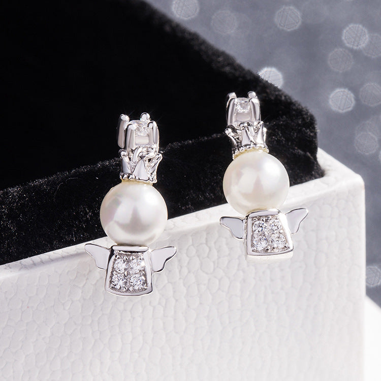 Petites boucles d'oreilles ange bébé