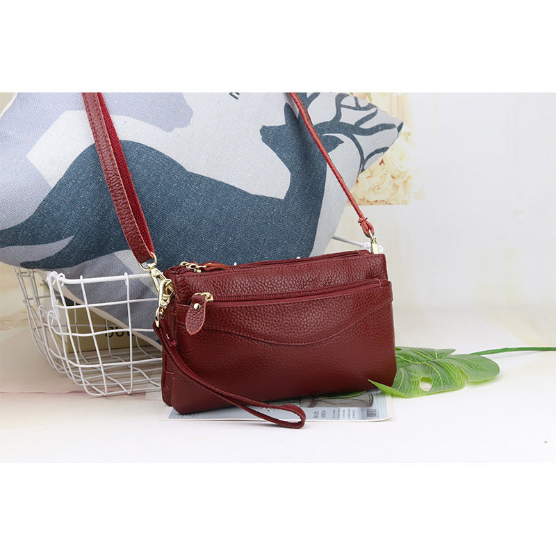 Les femmes petit sac de corps avec des compartiments multiples en cuir plein grain