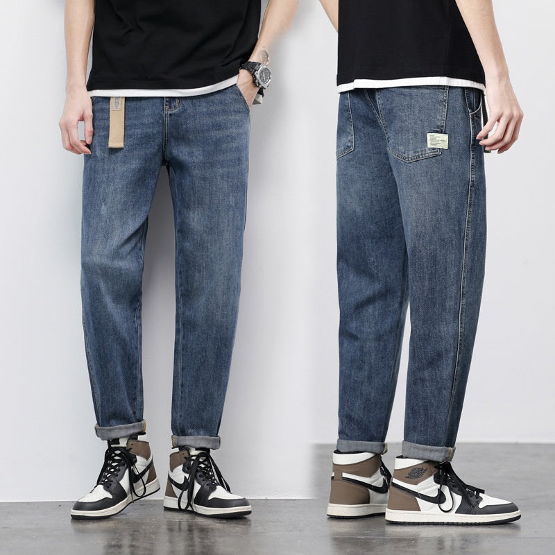 Jeans Denim minces Hommes perdre la jambe droite