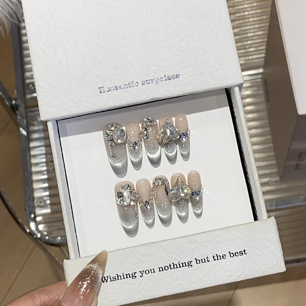Boutons de ongles souriants pour chat-eye