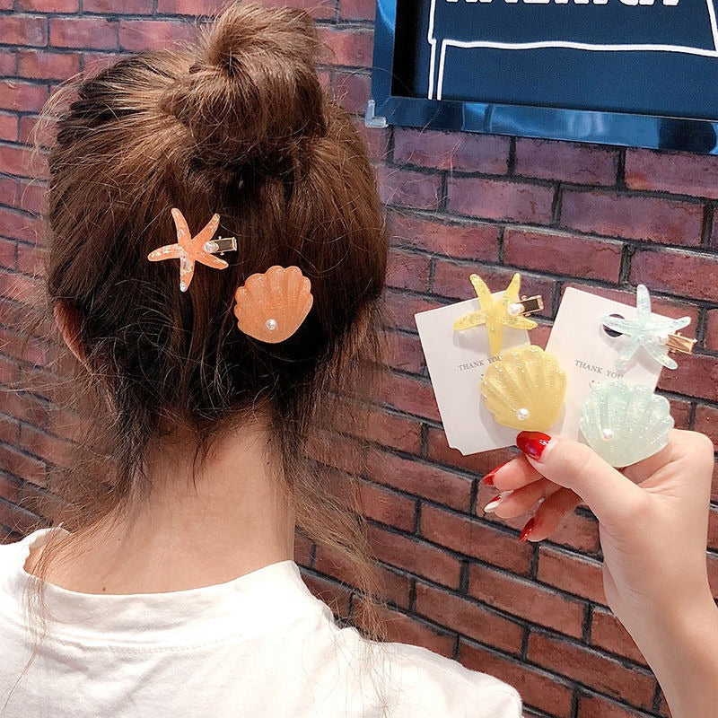 Barrettes d'étoiles de coquillage