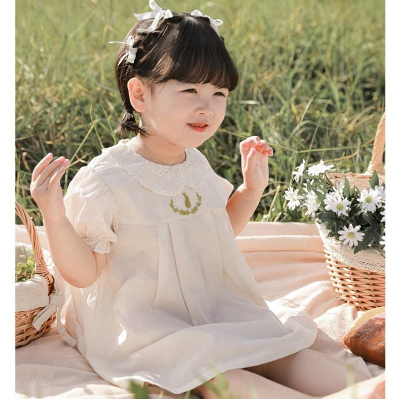 Robe blanche brodée en coton pur pour les filles