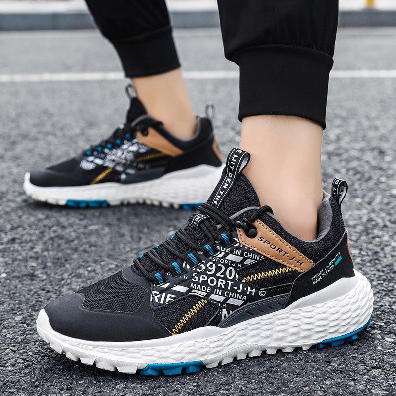 Chaussures homme à maille volante à bout rond