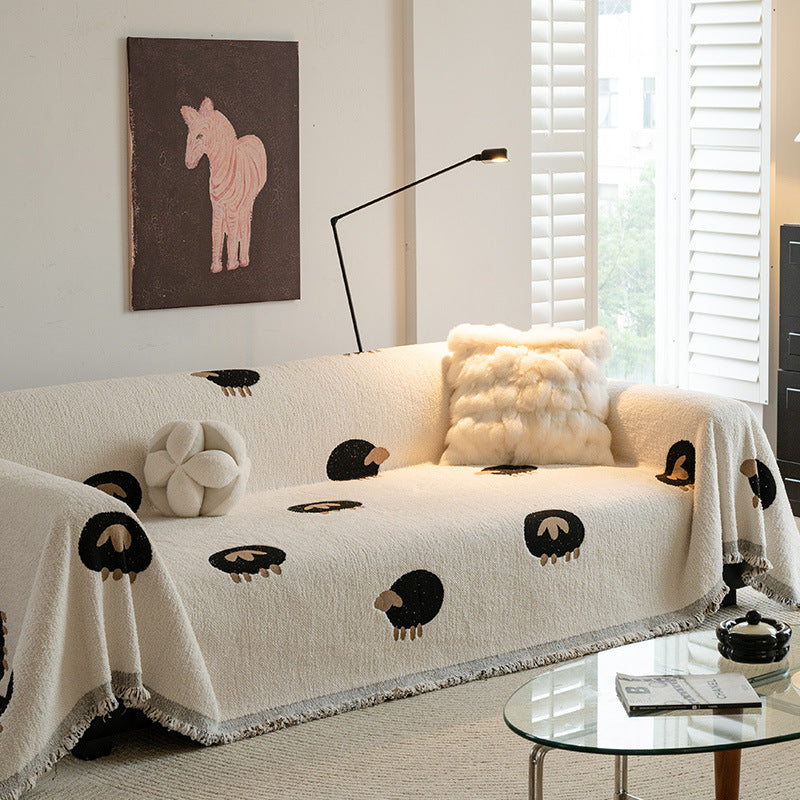 Couverture de canapé d'une pièce qui couvre entièrement le canapé