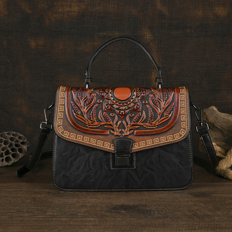 Sac à main artisanal avec une bande transversale et un design de bloc de couleur