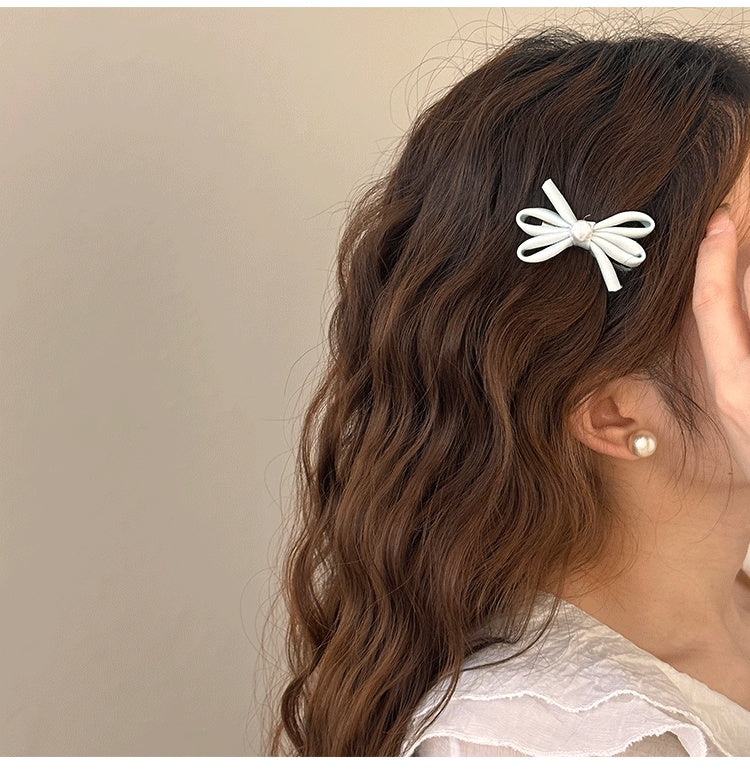 Clip latéral Bangs Pearl Bow Une paire de clips de canard