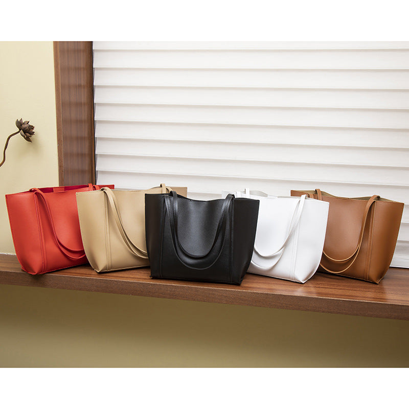 Ce sac à épaule multifonctionnel de style Niche est livré avec un plus petit