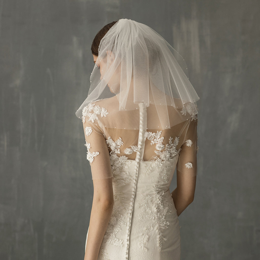 Rétro femme mariée courte coiffure mariée