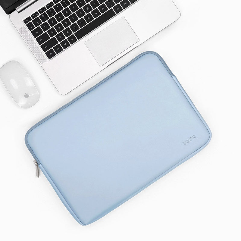 Internal leather laptop sleeve included
