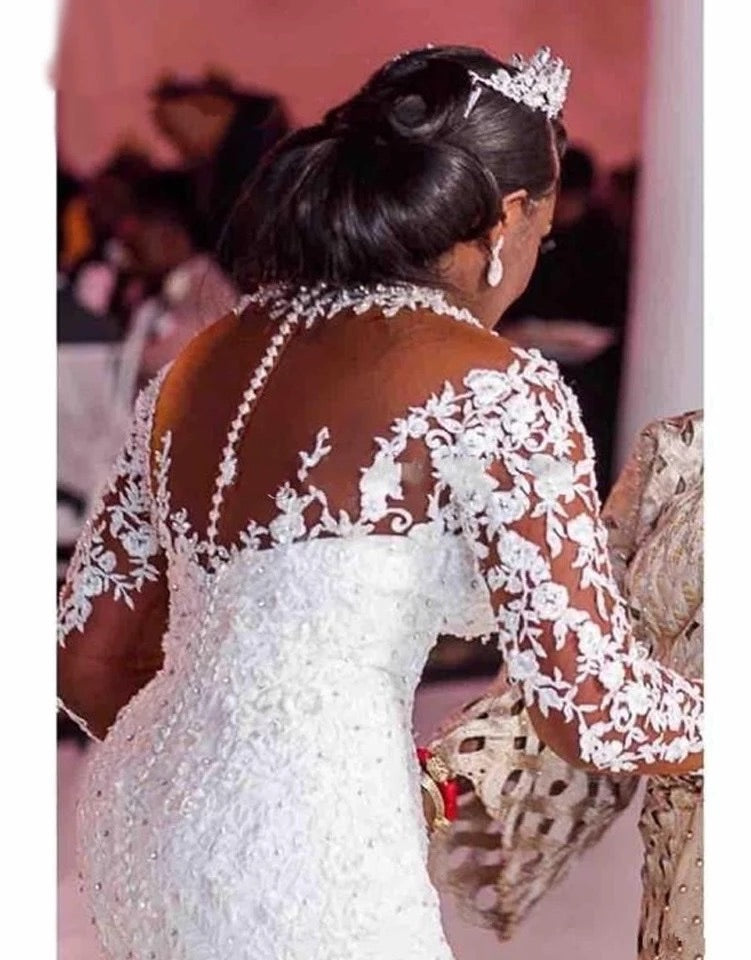 Robe de mariée blanche sirène manches longues