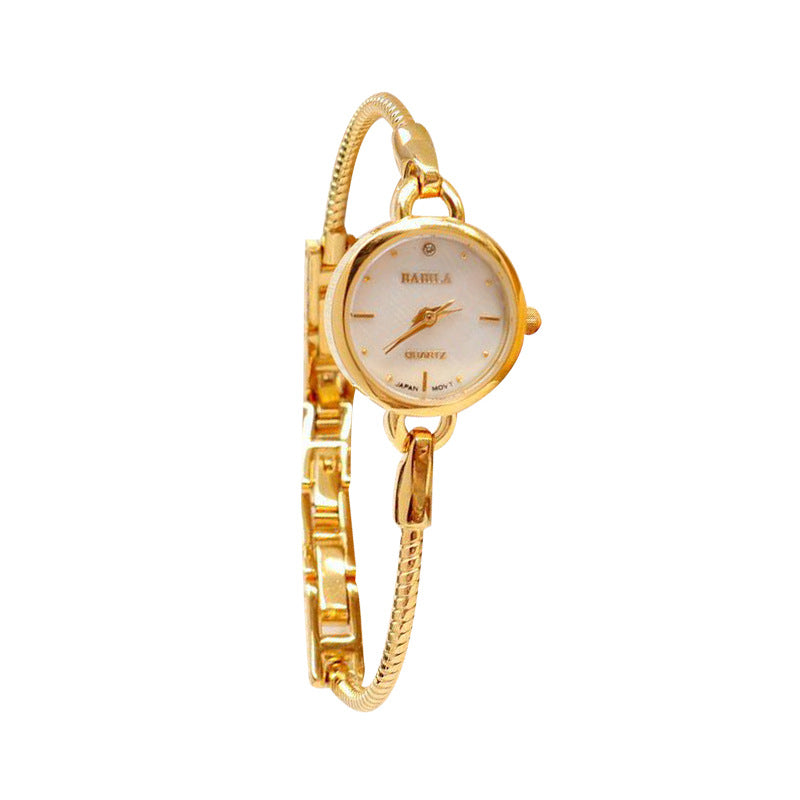 Rétro Petite montre dorée Quartz montre féminine
