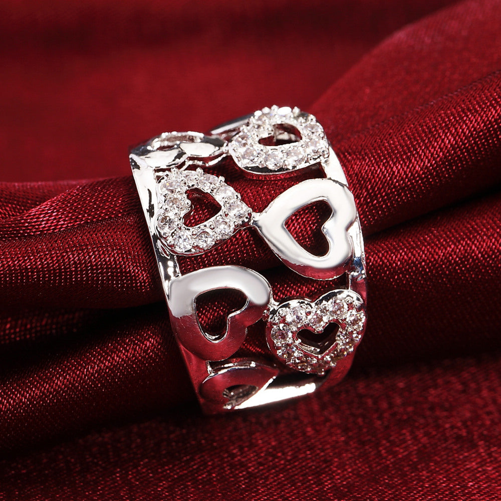 Anneau coupé en forme de cœur avec diamants